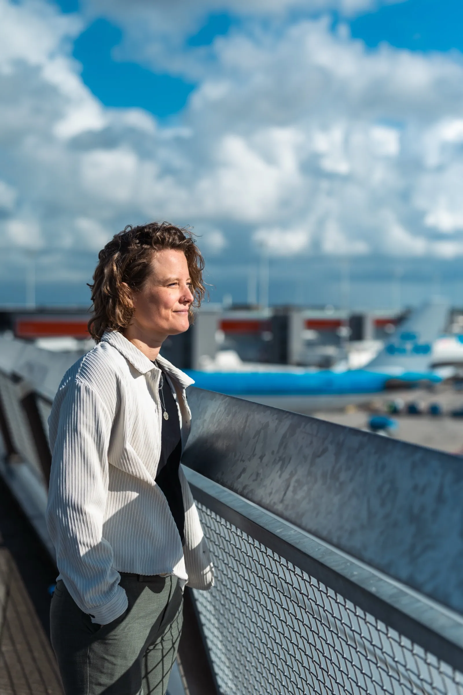 Roxanne Allard overlooking the apron at Schiphol Airport